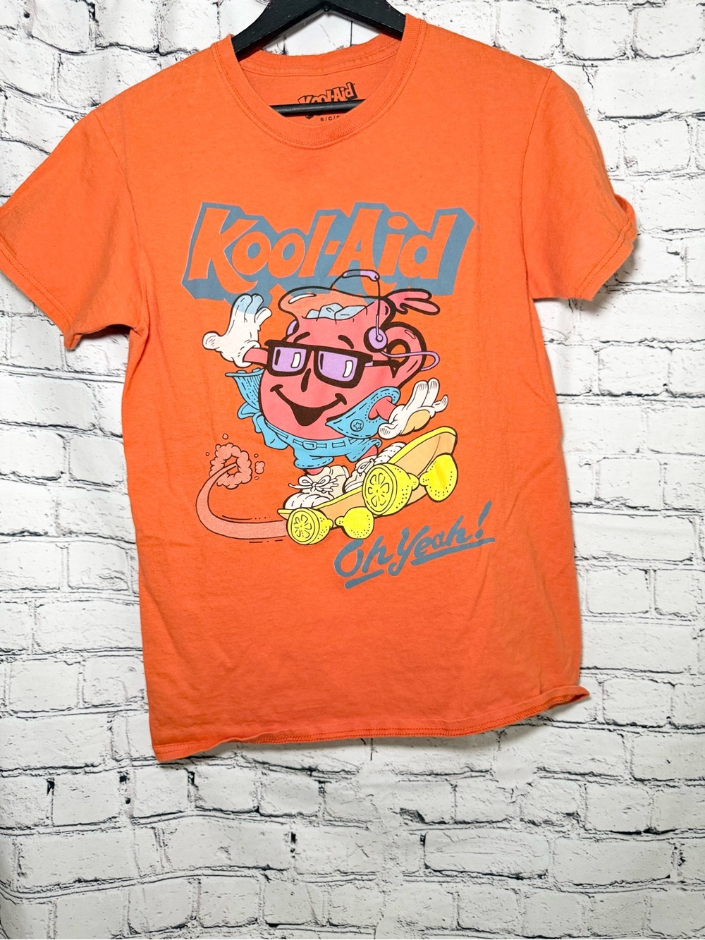 Kool aid. Orange graphic Tshirt. S